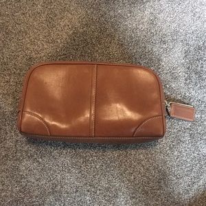 Coach tan toiletry bag